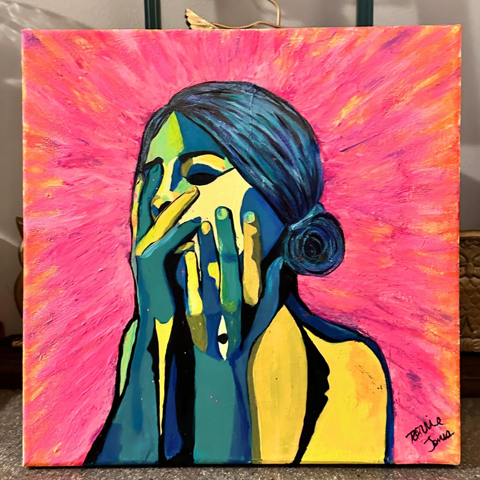 In Her Thoughts — original painting of a woman with teal and yellow hands against a vivid pink background, signed by Torrie Jones